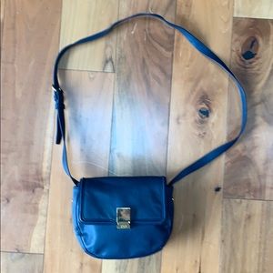 C. Wonder leather Crossbody purse